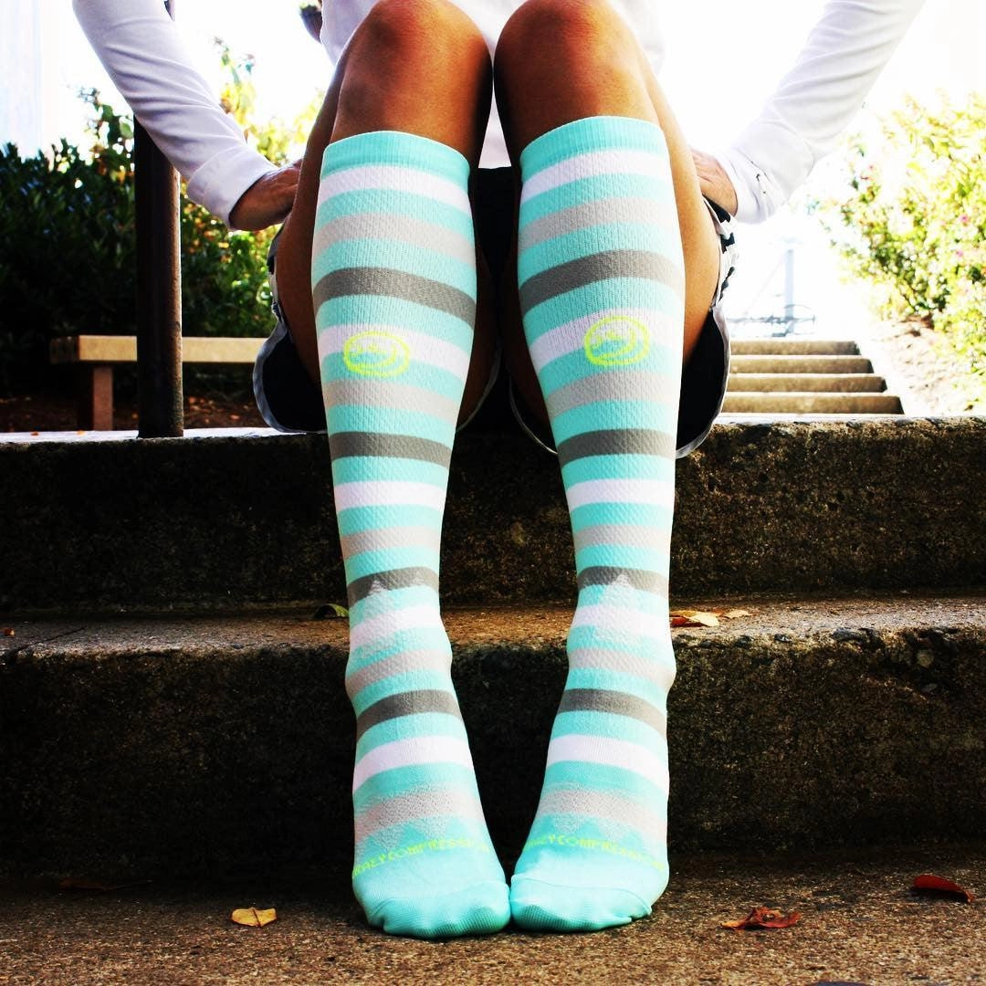 Square blog photo of Crazy Compression socks worn on shift